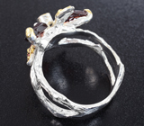 Серебряное кольцо с резными пиропами и ограненными родолитами гранатами