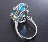 Серебряное кольцо с голубым топазом 21,78 карата и васильковыми сапфирами Серебро 925