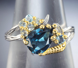 Симпатичное серебряное кольцо с насыщенно-синим и голубыми топазами