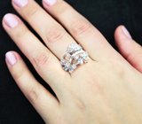 Романтичное серебряное кольцо с голубыми топазами