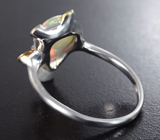 Серебряное кольцо с кристаллическим эфиопским опалом 1,9 карата, цаворитами и родолитами