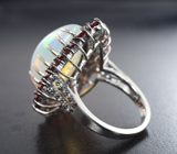 Серебряное кольцо с кристаллическим эфиопским опалом 10,82 карата, красными и васильковыми сапфирами бриллиантовой огранки Серебро 925