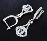 Симпатичные серебряные серьги с голубыми топазами Серебро 925