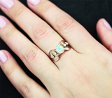 Серебряное кольцо c кристаллическим эфиопским опалом и голубыми топазами
