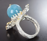 Серебряное кольцо cо сферой аквамарина, голубыми топазами, перидотами и родолитами