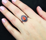 Яркое серебряное кольцо с ограненным оранжевым опалом и синими сапфирами бриллиантовой огранки Серебро 925