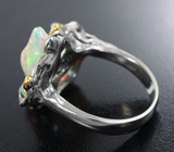 Серебряное кольцо с кристаллическими эфиопскими опалами 4,21 карата и цаворитами