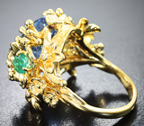 Золотое кольцо с крупным редким максис-бериллом высокой чистоты 8,2 карата, «неоновыми» изумрудами и бриллиантами Золото