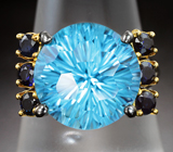 Серебряное кольцо с голубым топазом лазерной огранки 6,12 карата и синими сапфирами Серебро 925