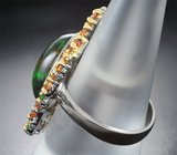 Серебряное кольцо с кристаллическим черным опалом 5,04 карата, желтыми сапфирами и цаворитами