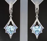 Эффектные серебряные серьги с голубыми топазами Серебро 925