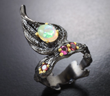 Серебряное кольцо с кристаллическим эфиопским опалом и родолитами  Серебро 925