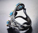Серебряное кольцо с голубыми и бесцветными топазами Серебро 925