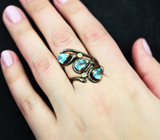Серебряное кольцо с голубыми и бесцветными топазами Серебро 925