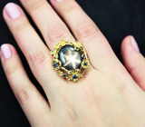 Массивное золотое кольцо с крупным звездчатым 27,59 карата и синими сапфирами Золото