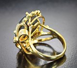 Золотое кольцо c крупным звездчатым сапфиром 22,44 карата, синими сапфирами и россыпью бриллиантов Золото