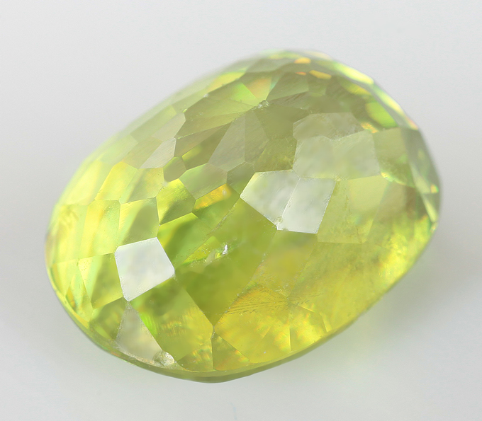 Заказать Кольцо с малым овальным камнем: Желто-зеленый сфен 4,09 карата вювелирной мастерской Серебряные линии