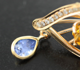 Золотое кольцо с ярким гелиодором авторской огранки 4,61 карата, синим сапфиром и бриллиантами высоких характеристик Золото