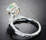 Серебряное кольцо с кристаллическим эфиопским опалом и родолитами Серебро 925