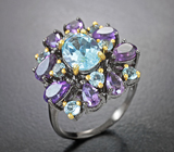 Серебряное кольцо с голубыми топазами и аметистами
