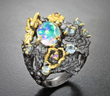 Серебряное кольцо с ограненным эфиопским опалом, голубыми топазами и аметистами Серебро 925