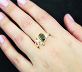 Серебряное кольцо с крупным диопсидом и перидотами