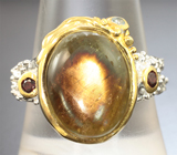 Серебряное кольцо c звездчатым сапфиром, родолитами гранатами и голубым топазом Серебро 925