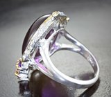 Серебряное кольцо с аметистом 19,32 карата, голубыми топазами, малым аметистом  и апатитами