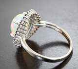 Серебряное кольцо с кристаллическим эфиопским опалом и черными шпинелями