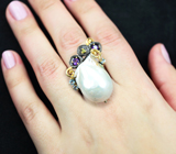 Серебряное кольцо с жемчужиной барокко, аметистами и голубыми топазами
