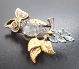 Серебряная брошь с рутиловым кварцем, альмандинами гранатами и голубыми топазами Серебро 925
