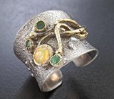 Серебряное кольцо с кристаллическим эфиопским опалом и изумрудами