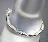 Серебряное кольцо с муассанитом топовой огранки 0,09 карата