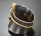 Серебряное кольцо с голубым топазом и диопсидами Серебро 925