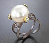Серебряное кольцо с жемчугом и голубыми топазами