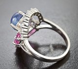 Оригинальное серебряное кольцо с танзанитом и рубинами