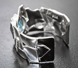 Оригинальное серебряное кольцо с голубым топазом