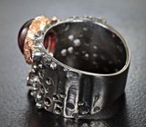 Серебряное кольцо с родолитом 4,83 карата и аметистами