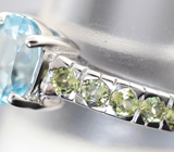 Чудесное серебряное кольцо с голубым топазом и перидотами Серебро 925