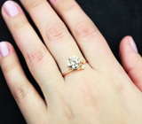 Золотое кольцо с бесцветным муассанитом бриллиантовой огранки 1,8 карата и лейкосапфирами