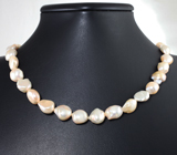 Массивное золотое колье с крупным морским жемчугом барокко золотисто-розового люстра 246,8 карата