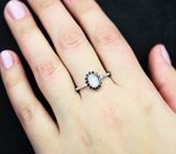 Изящное серебряное кольцо с лунным камнем и шпинелями