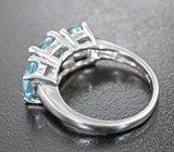 Эффектное серебряное кольцо с голубыми топазами Серебро 925
