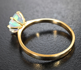 Золотое кольцо с ярким эфиопским опалом авторской огранки 0,88 карата