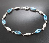 Изящный серебряный браслет с голубыми топазами