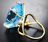 Крупное золотое кольцо с роскошным голубым топазом 30,75 карата и сапфирами
