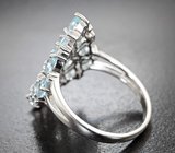 Шикарное серебряное кольцо с голубыми топазами