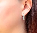 Эффектные серебряные серьги с кристаллическими эфиопскими опалами