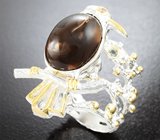 Скульптурное серебряное кольцо с дымчатым кварцем 8,19 карата и голубым топазом