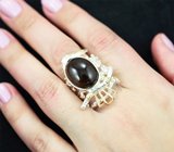 Скульптурное серебряное кольцо с дымчатым кварцем 8,19 карата и голубым топазом